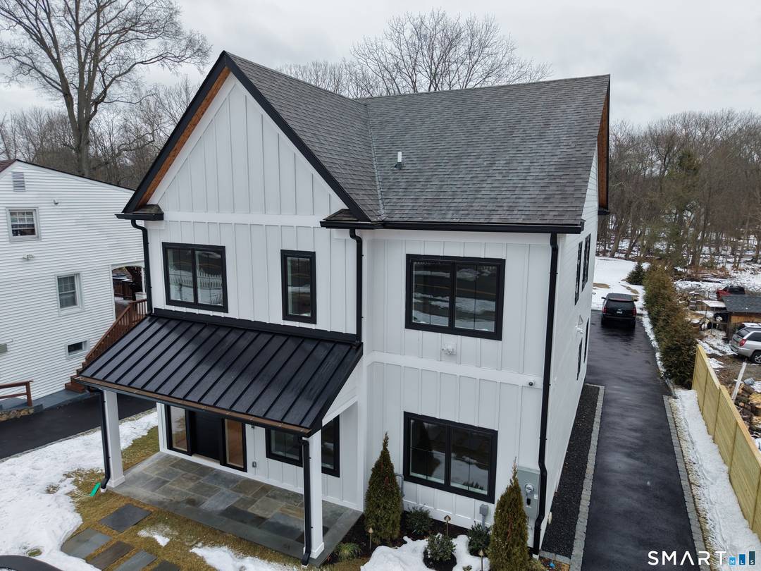 Stunning NEW CONSTRUCTION in the centrally located Springdale neighborhood of Stamford, CT.