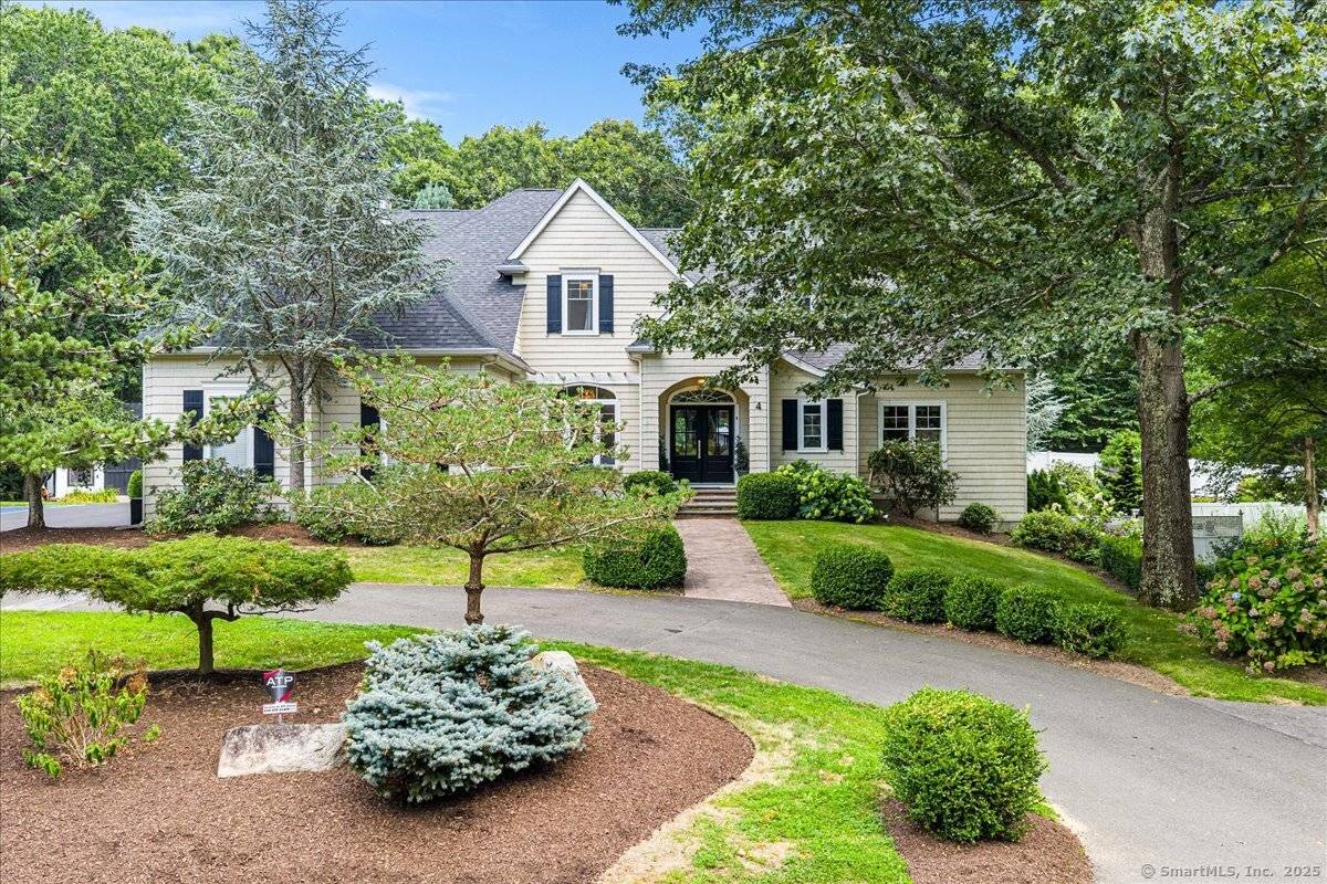 Welcome to 4 Laconia Drive, where timeless elegance meets modern sophistication.