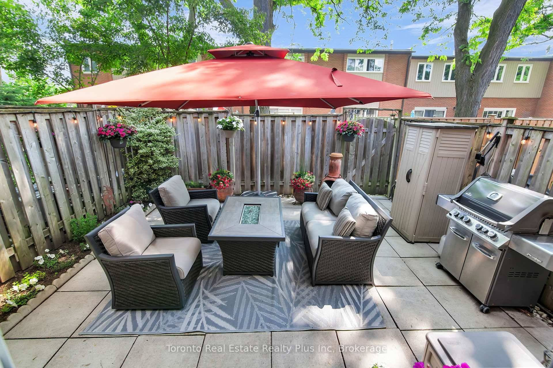 Beautiful 3 bedroom split level townhome features 12' cathedral ceiling in living room with a picturesque window walk out to a serene patio garden oasis, complimented by a raised separate ...