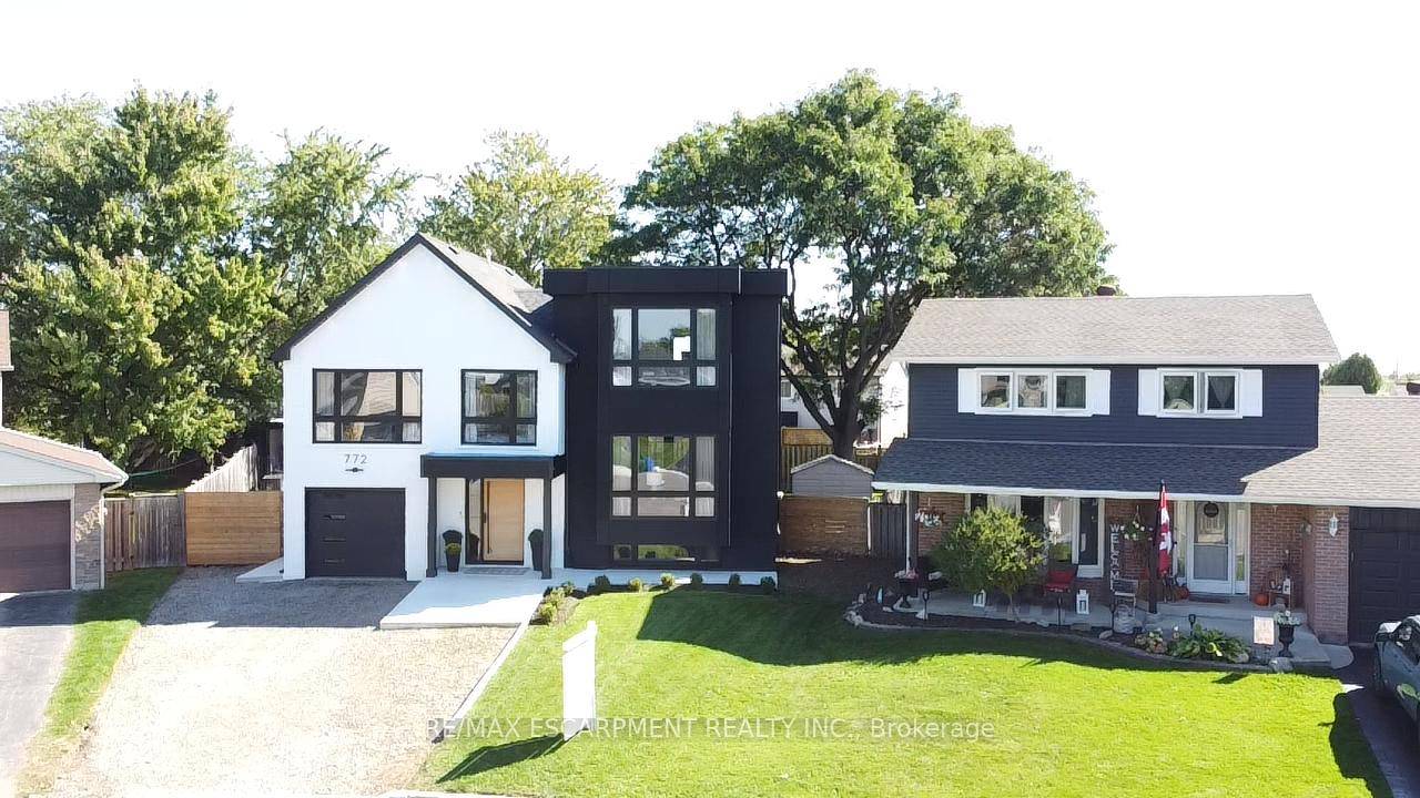 Welcome to 772 Banting Court a masterfully renovated and expanded luxury residence that effortlessly blends modern sophistication with family friendly living.