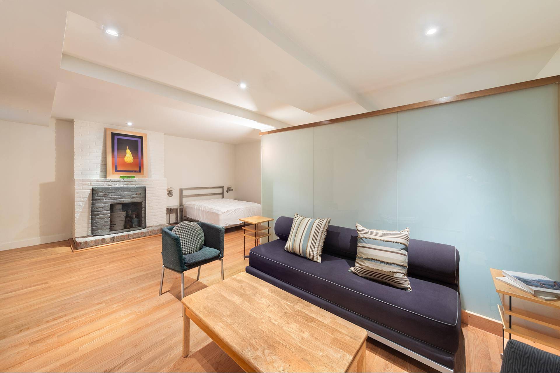 Move right into this spacious garden duplex in the highly coveted 325 West 52nd Street, a boutique cooperative located in the heart of Hell's Kitchen.