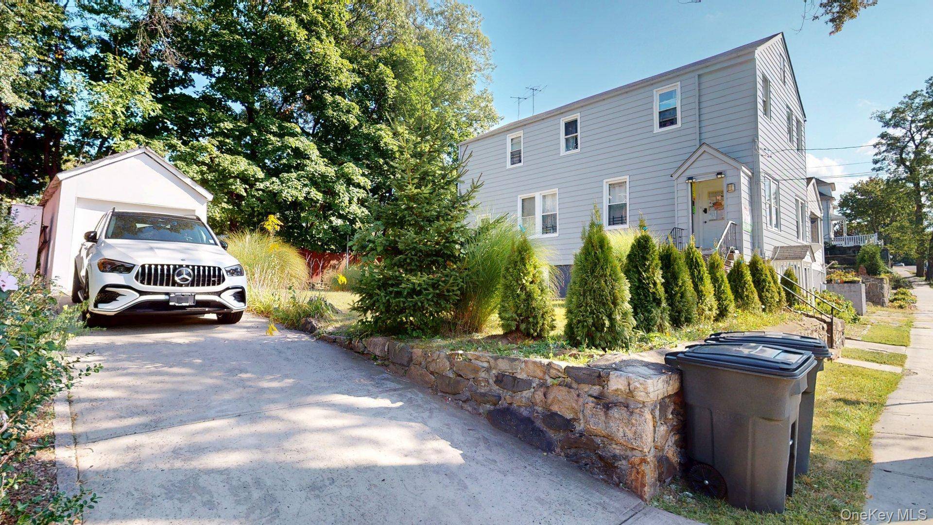 Two Family with Bonus Basement Room.