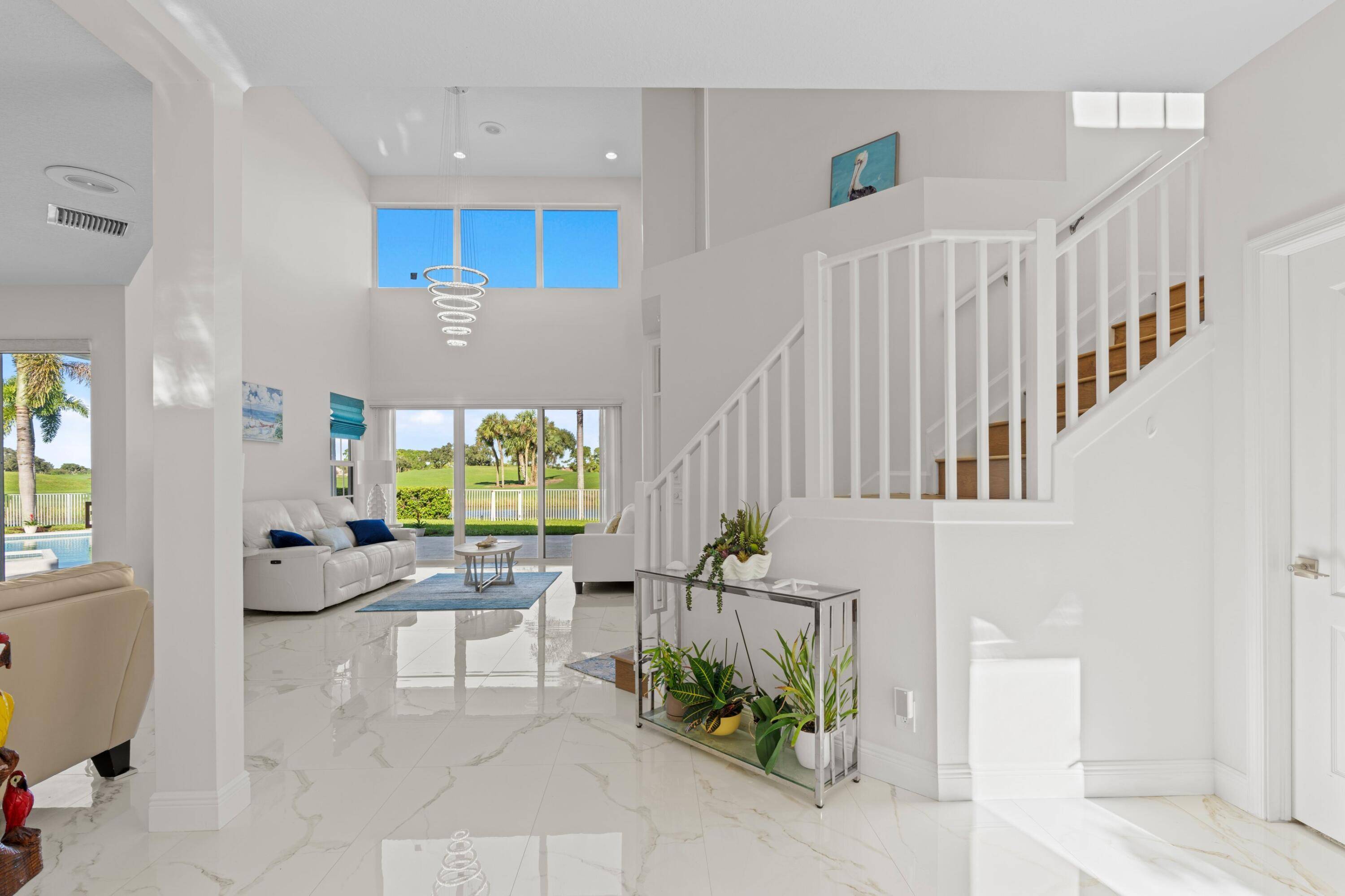 Enjoy luxury, privacy, and comfort in this stunning, light filled home nestled in the heart of PGA National.