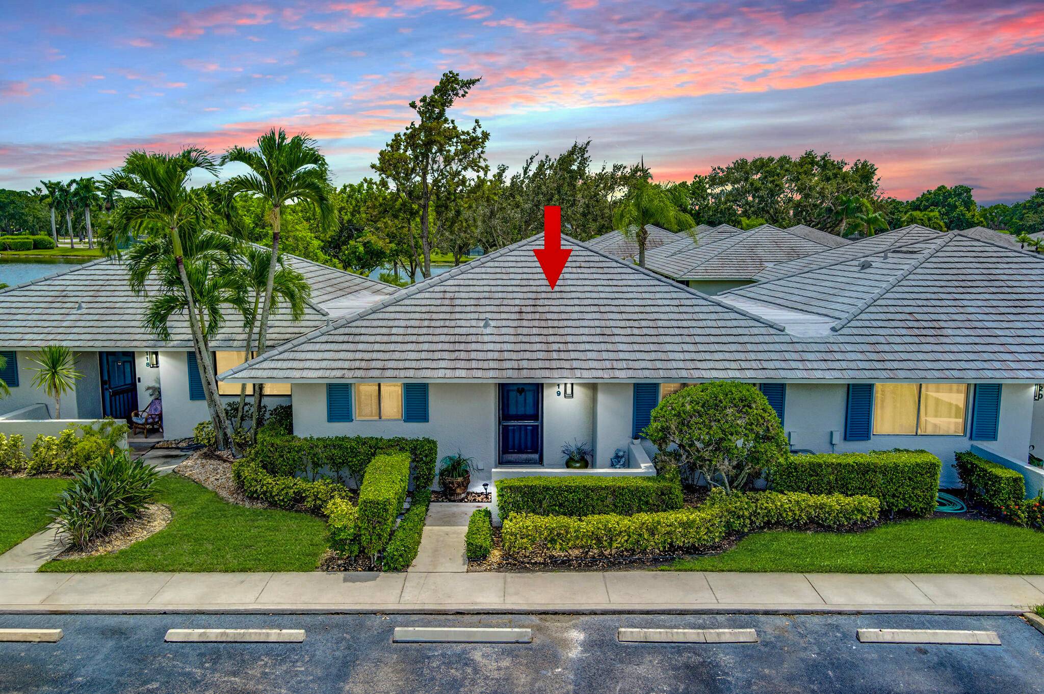 NEW PRICE Welcome to 119 Club Drive, a picturesque waterfront villa located in the prestigious PGA National Resort in Palm Beach Gardens, FL.