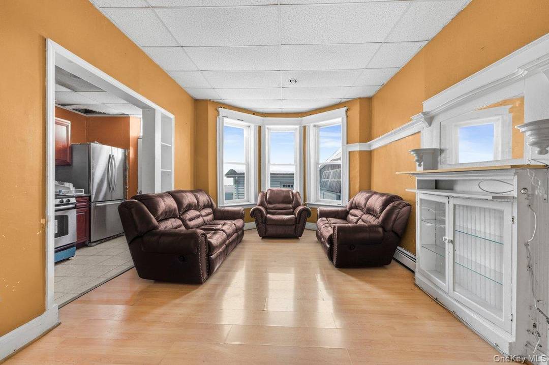 Well maintained two family style home featuring two floors with 3 spacious bedrooms, 1 full bathroom on each level, a full basement, kitchen, and living room.