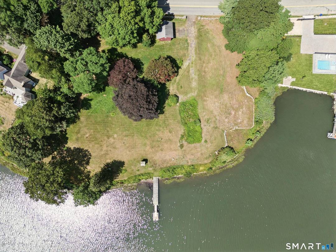 Set on a gentle promontory, this rare waterfront property features 1.