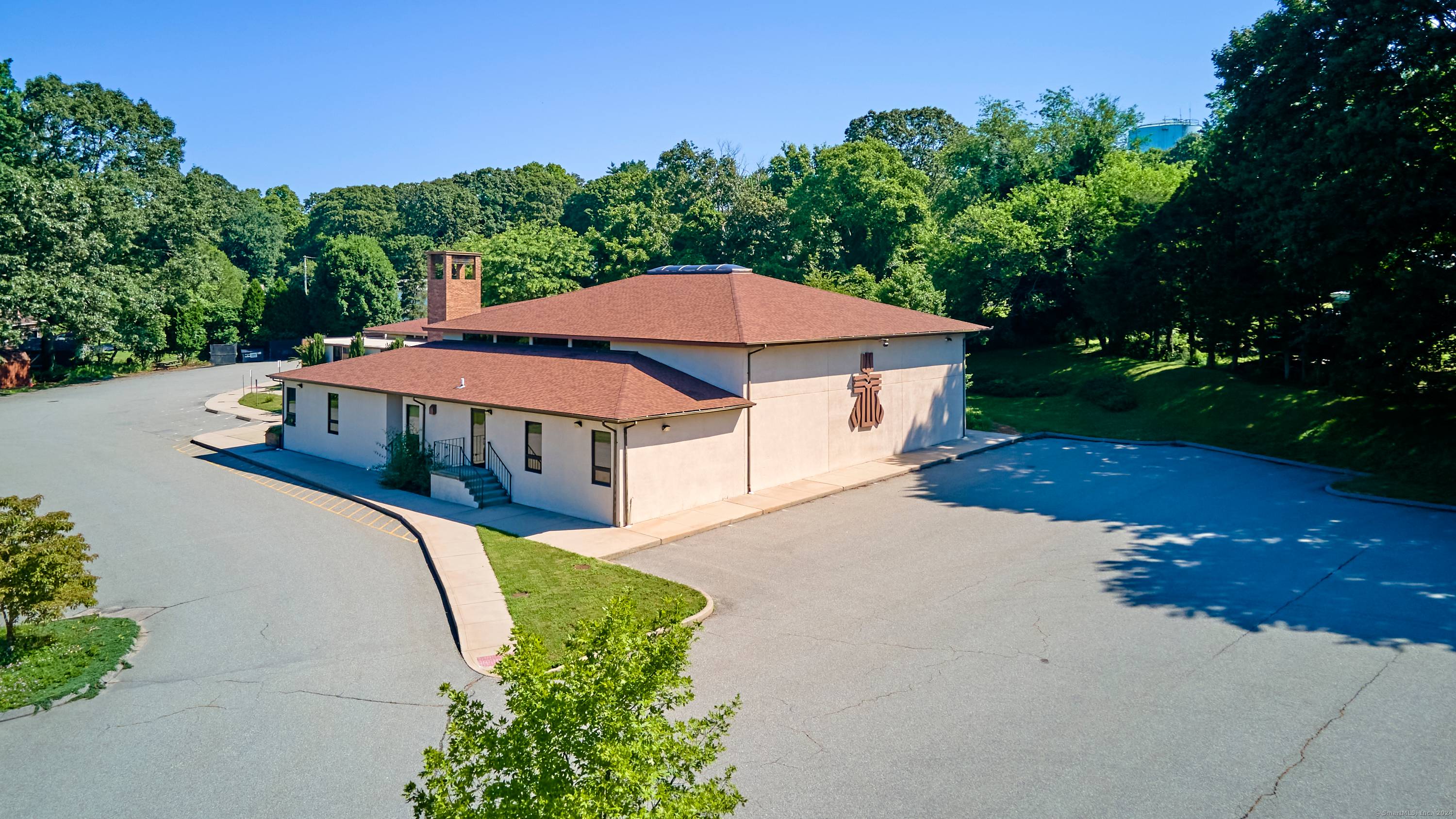 13, 570 square foot well maintained building currently used as a church but easily adaptable for many other potential uses such as office complex, school, health care, or land development, ...