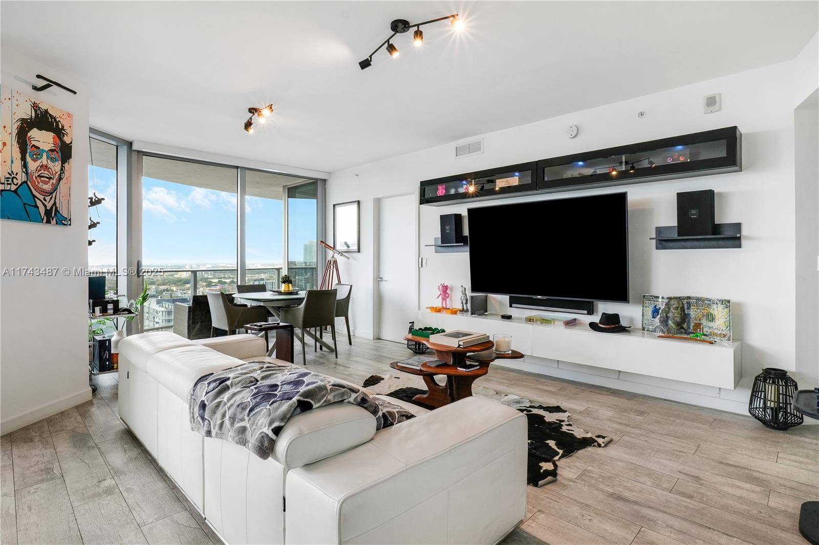 Experience a luxury life in this beautiful corner unit with open space, great lighting and expansive sunset views.