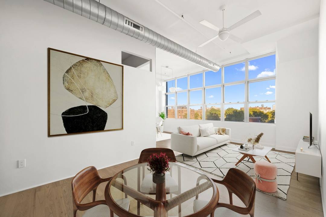 Welcome home to this extraordinary, expansive, sunny and super cool 812sf condo loft with a wall of windows, 11ft ceilings, concrete column, original oak floors, industrial touches, in unit laundry, ...