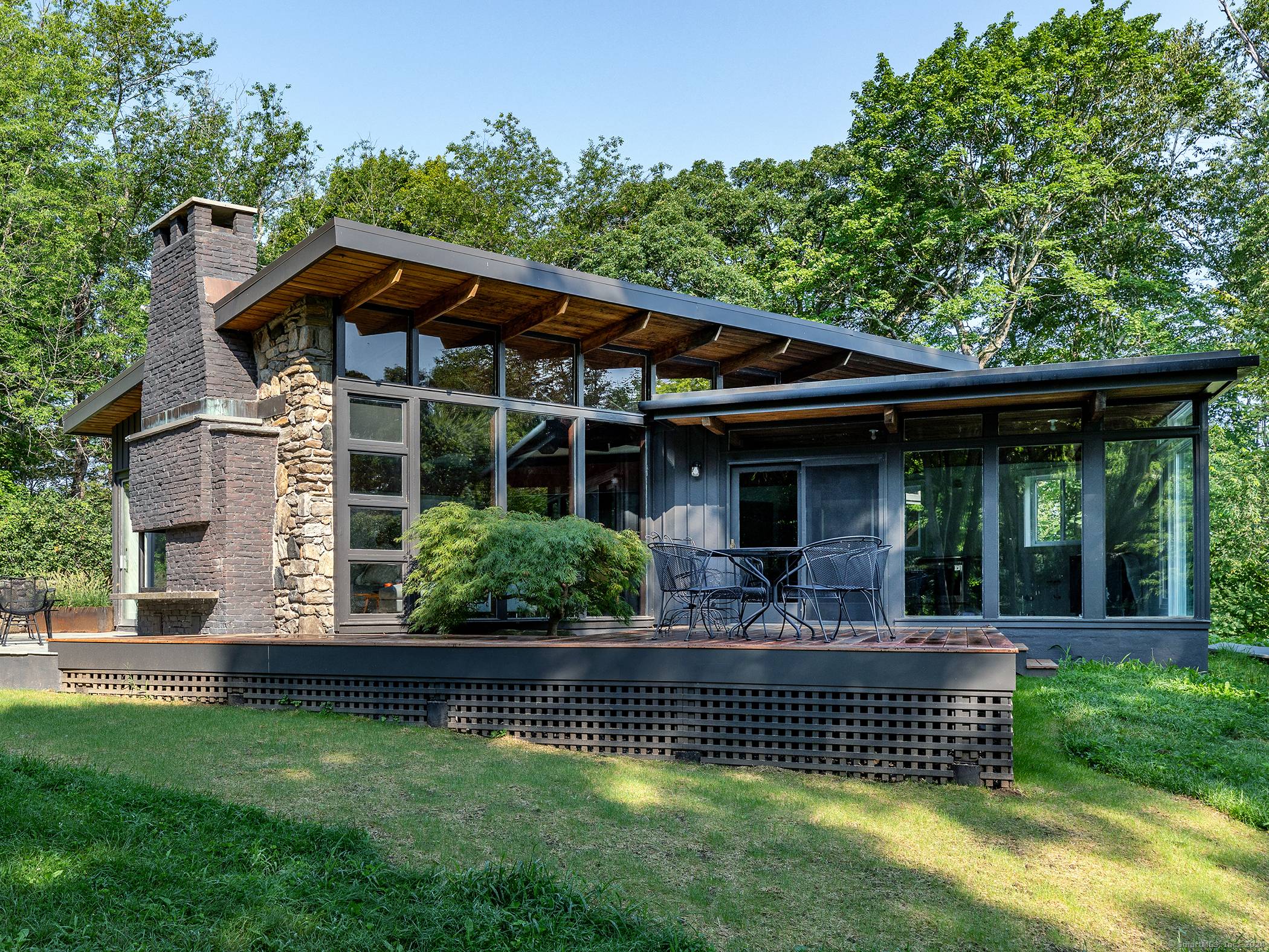 Super chic mid century overlooking the Johnson Farm Preserve with hiking trails directly from the house.