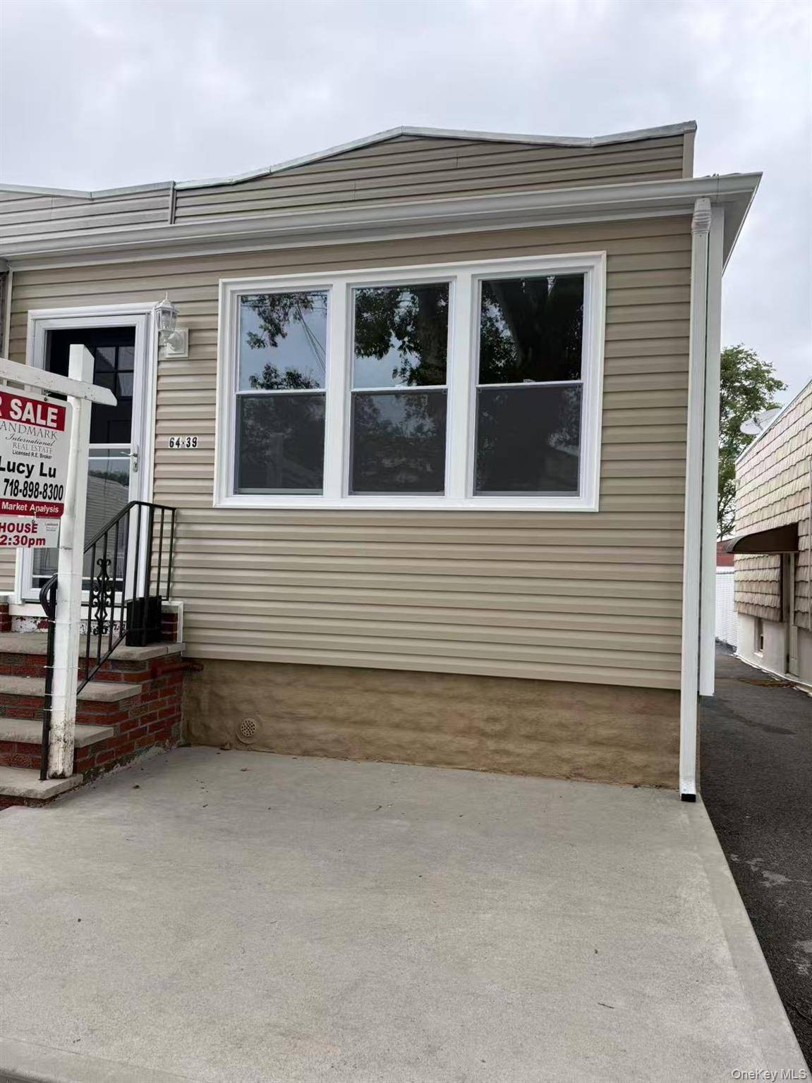 Semi detached bungalow on the Maspeth horseshoe.