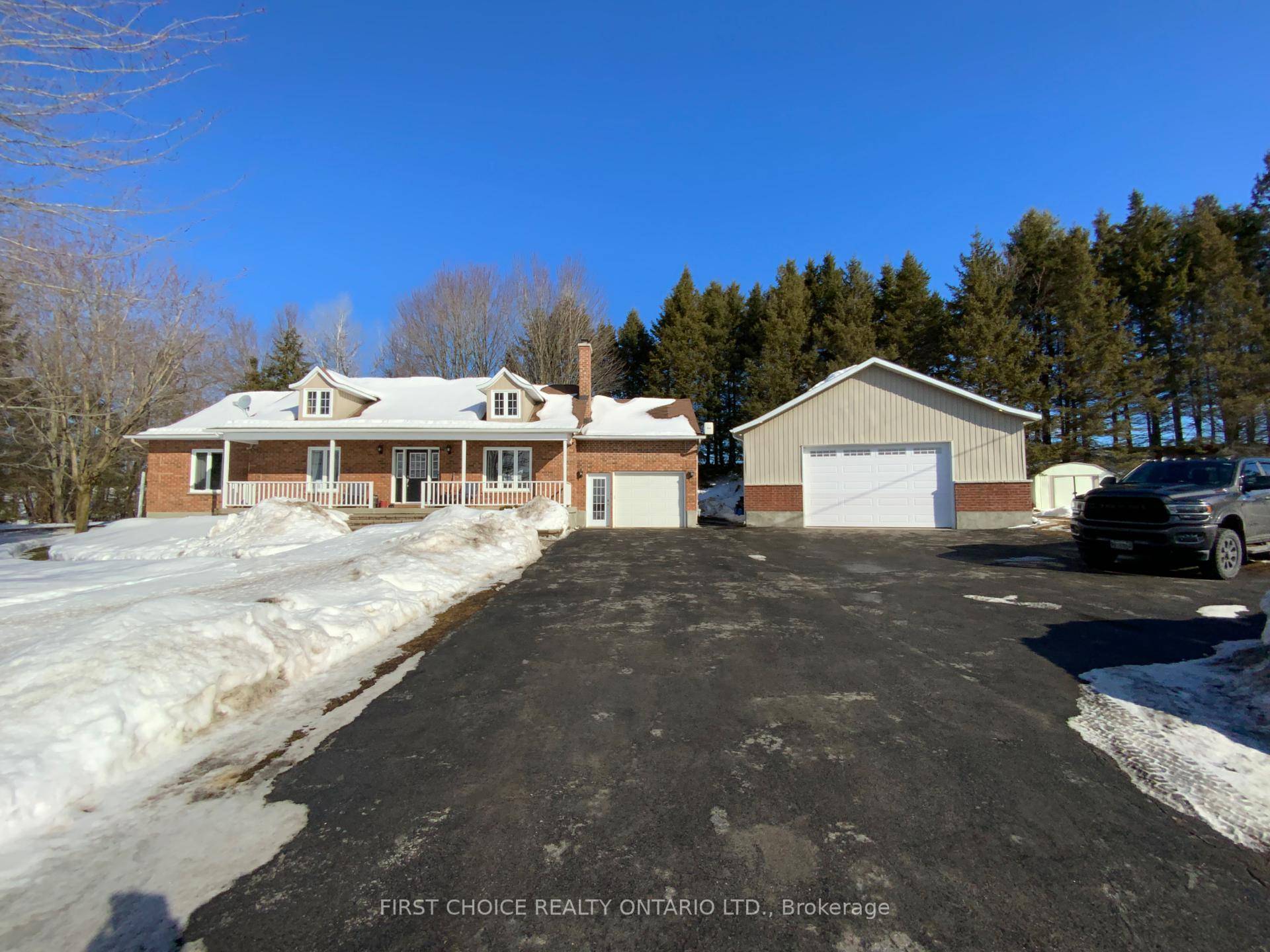 Country Bungalow, on a private lot with a Custom luxury Detached garage !