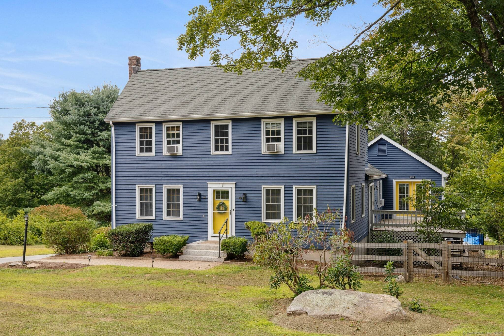 Spacious Colonial home offers 4 bedrooms, with first floor primary suite.