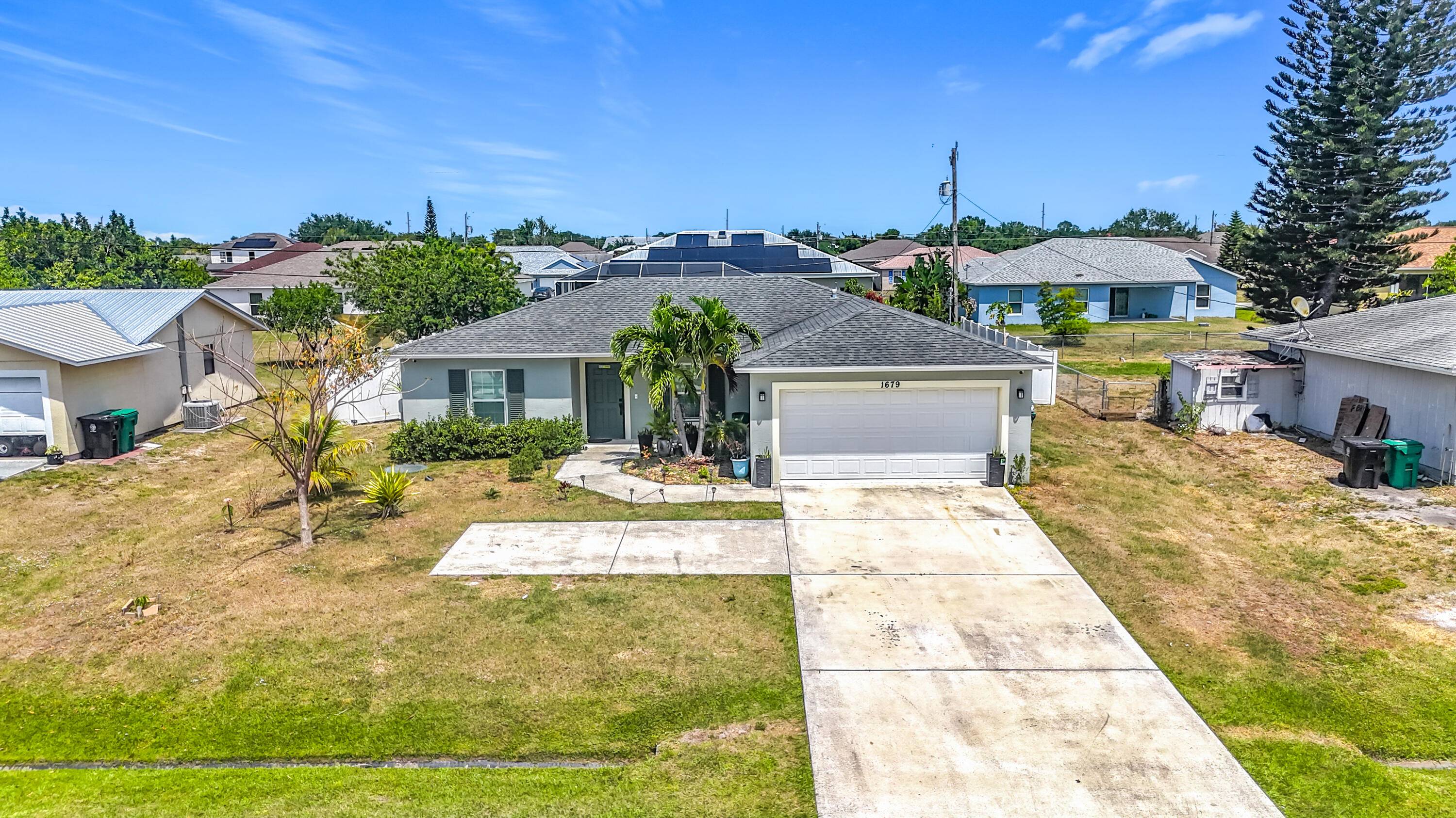 This beautifully maintained 3 bedroom, 2 bath residence offers 2, 071 sq ft of comfortable living space, complete with a spacious car garage.