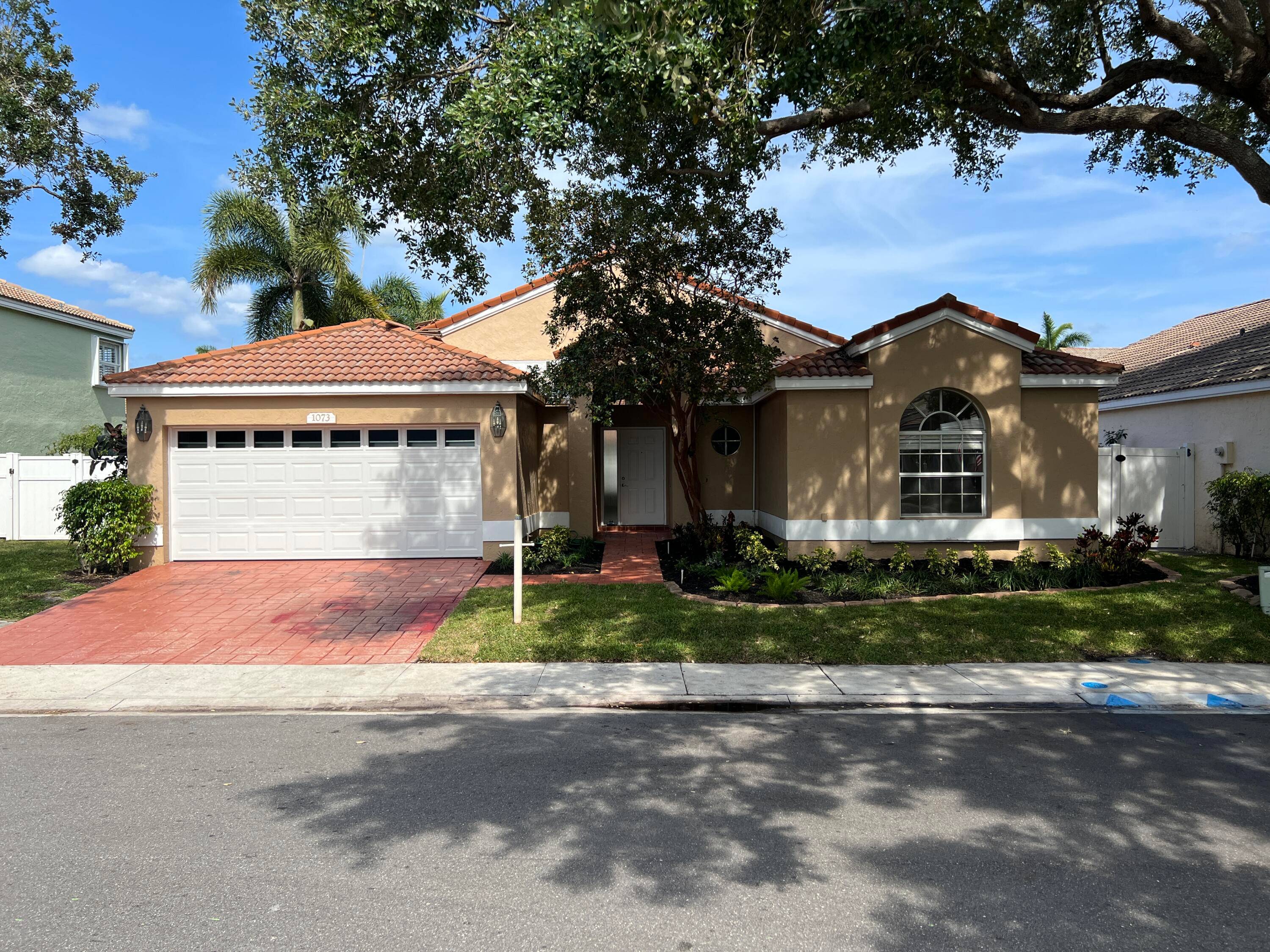 3 bedroom 2 bath one story home no stairs with 2 car garage in Siena Oaks in Palm Beach Gardens.
