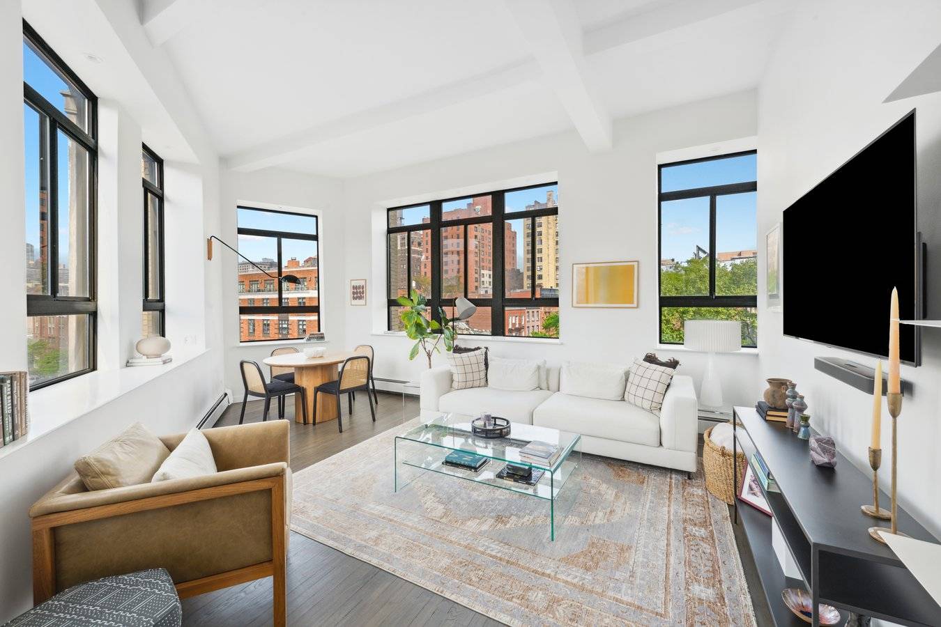 Come view and fall in love with this renovated 2 bedroom 2 bathroom corner loft with 19 windows and 3 exposures including direct views of the Empire State Building.