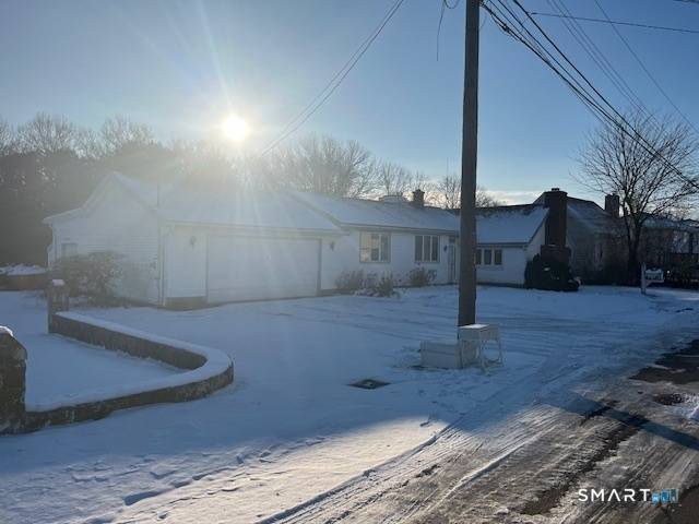 Spacious open concept home filled with natural light, featuring soaring 12 ft cathedral ceilings and a cozy fireplace.