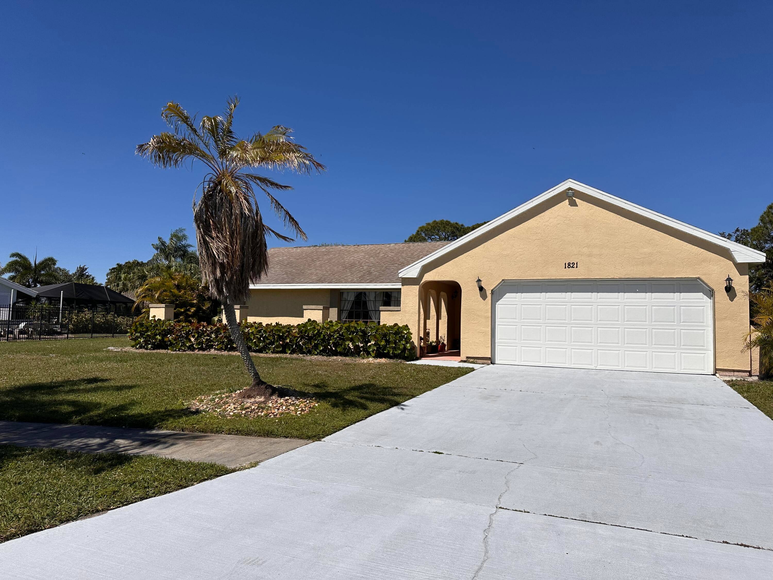 Sandpiper Bay ! This beautifully maintained 3 bed, 2 bath home w a 2 car garage on an estate sized lot, offering a blend of comfort, privacy resort style living.