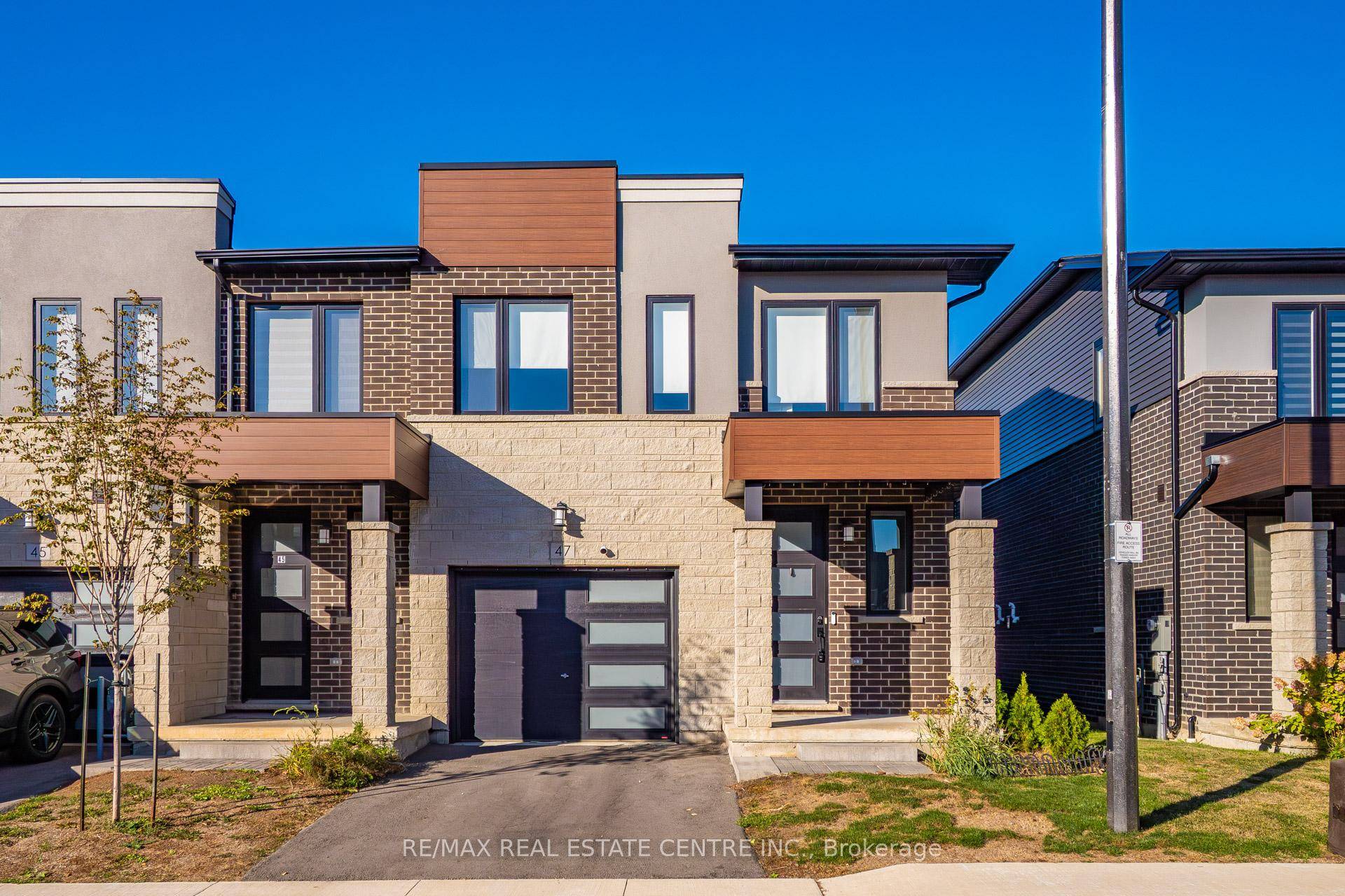 Executively built luxury townhome in the heart of Hamilton, fully upgraded from top to bottom with nearly 70, 000 in builder upgrades.