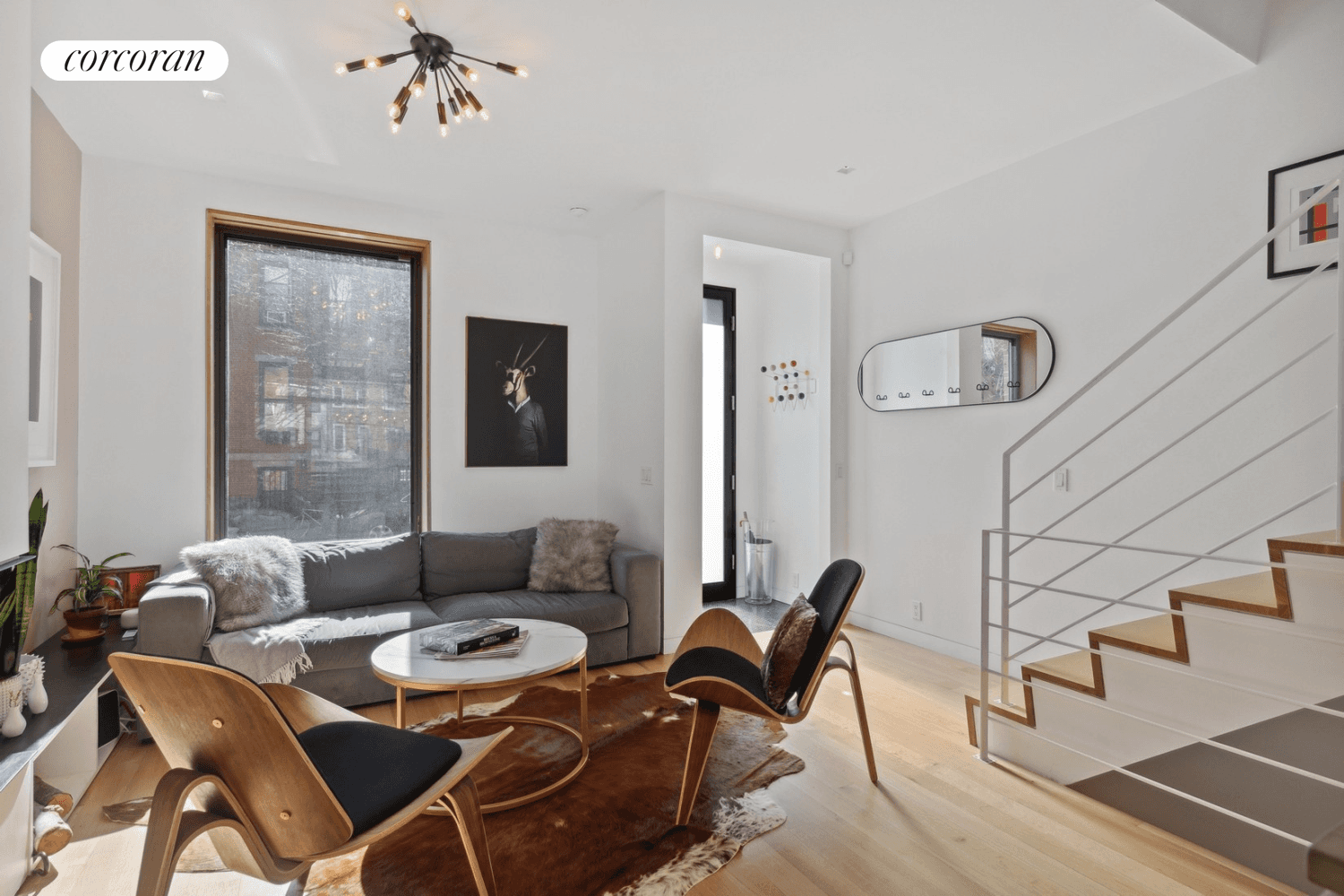 Designed by a renowned Brooklyn architect, 319 Carroll Street is a stunning townhouse in triple mint condition with 4 stories, a dramatic primary suite, 4 bedrooms, 3.