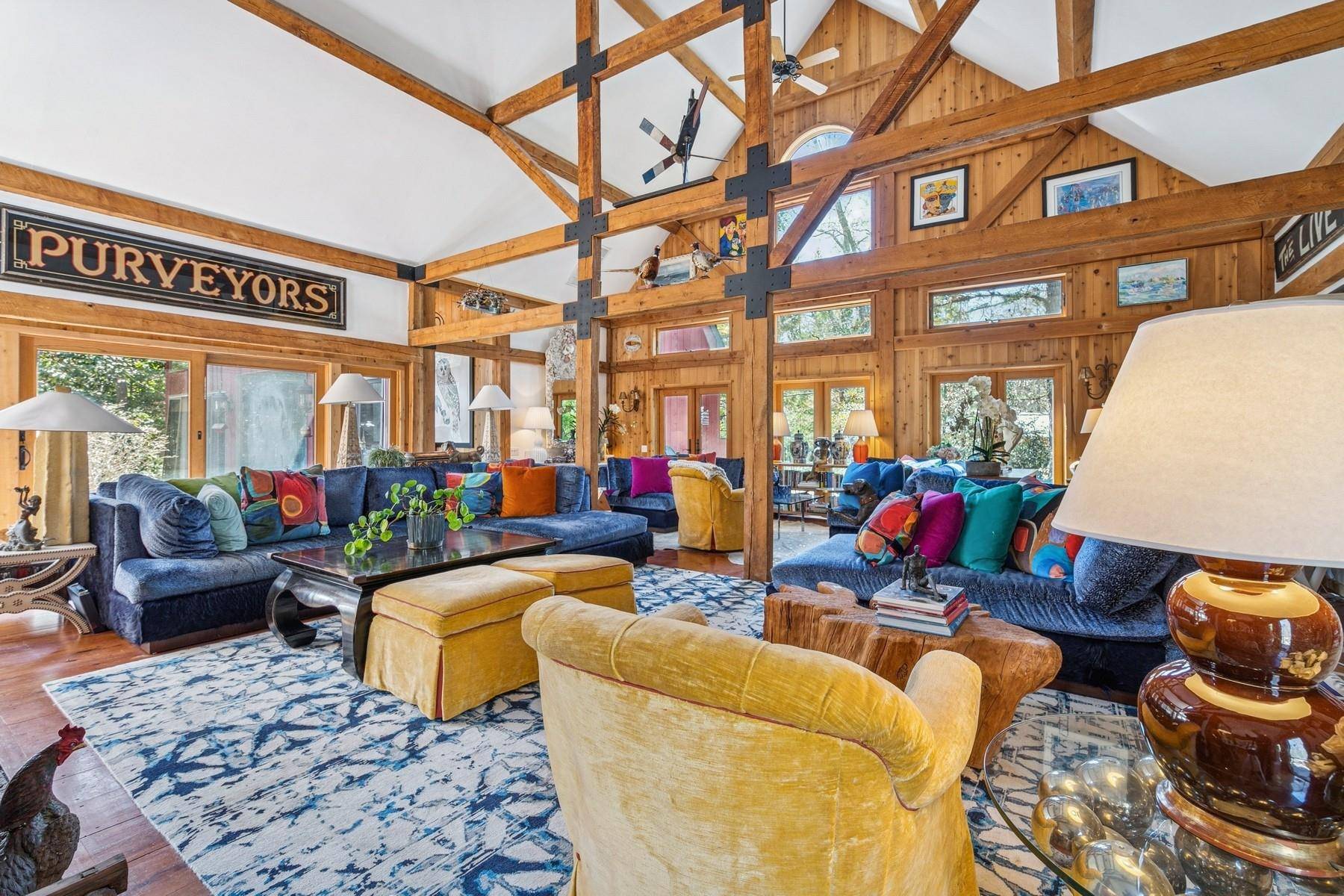 A Vibrant Summer Escape Charming Barn Style Retreat in East Hampton Embrace the best of East Hampton living in this barn style home filled with the joyful colors of summer.