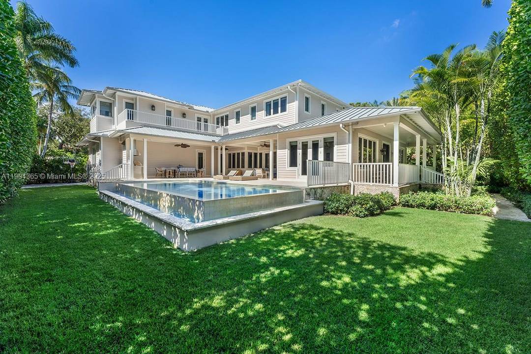 Set on prestigious Sunset Island II, this 2016 ground up, custom built residence designed by award winning architect David Johnson offers 4 ensuite bedrooms, a media pajama lounge with wet ...
