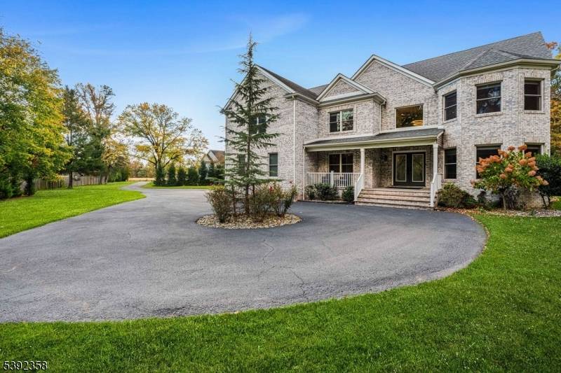 Nestled on over an acre and surrounded by preserved farmland, this stunning custom built Colonial offers more than 5, 000 square feet of elegant living space across three levels.