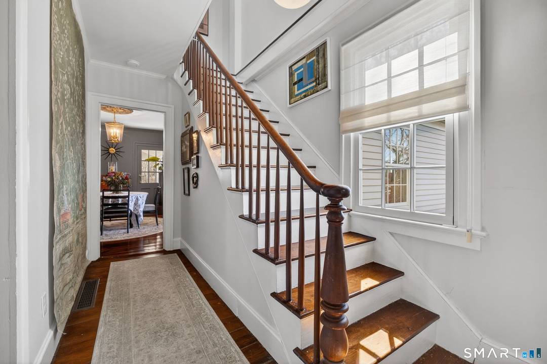 Experience the essence of Essex village living in this distinguished historic home.
