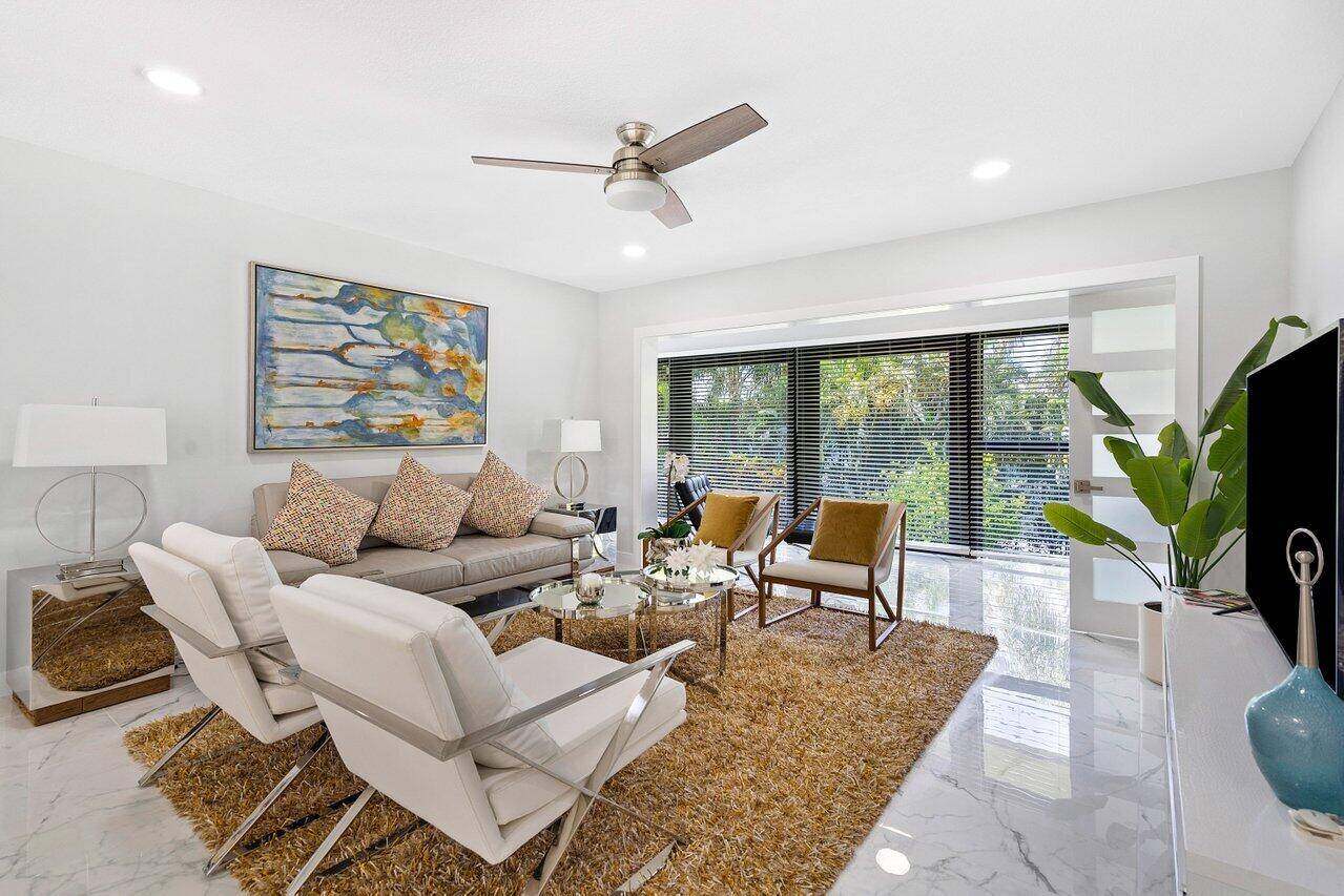 Beautiful, spacious 2 bedroom condo, newly renovated including impact glass.
