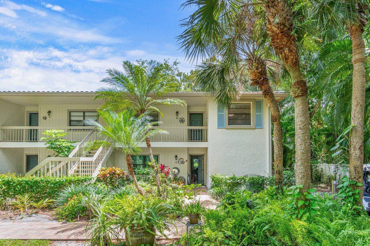 Enjoy the best of country club living at Hunters Run in this updated, upstairs corner unit with water views and newly remodeled kitchen !