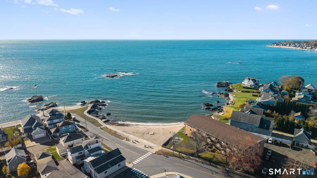 Brand new, never lived in three bedroom END UNIT townhome with water views from the bedroom.