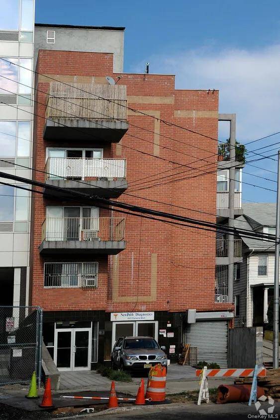 Newly renovated 2 bedroom, 2 bath condominium located in the heart of Downtown Flushing, near Main Street.