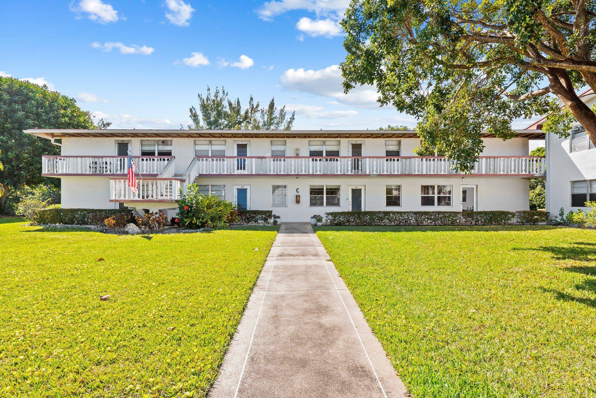 Welcome to this meticulously well maintained first floor residence located in Century Village.
