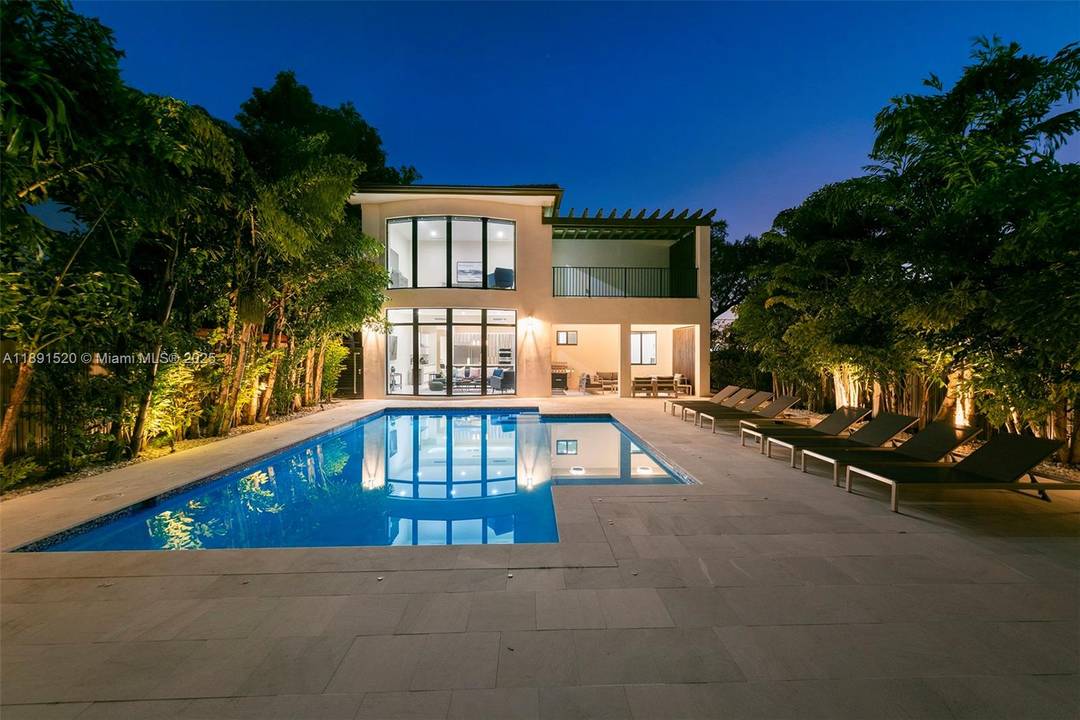 Welcome to 6529 SW 30th St, a striking, contemporary Mediterranean residence built in 2018 and designed for both luxury living and high performing short term rental income.