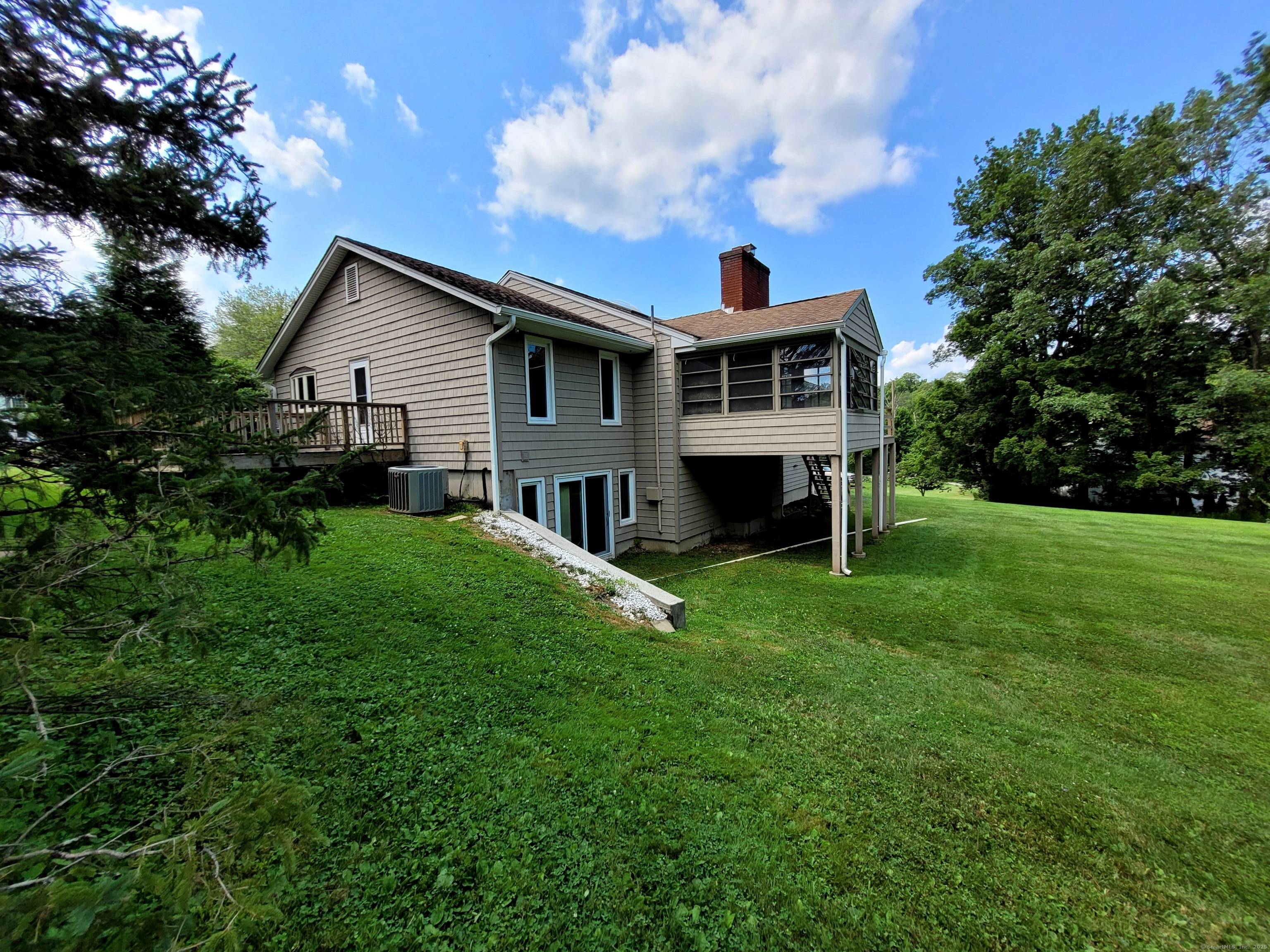 Welcome to 7 Carriage Lane, New Fairfield, Connecticut tucked away on a quiet, picture perfect cul de sac, this charming home is set back from the road surrounded by other ...