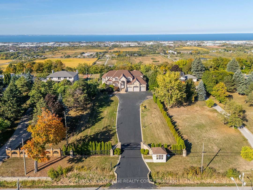 Welcome to 803 Ridge Road an extraordinary custom built residence set on a pristine 0.