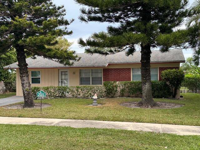 2 bedroom 1 bath plus an enclosed 1 car garage that can be used as an additional den concrete block CBS home with a screened patio overlooking a huge back ...