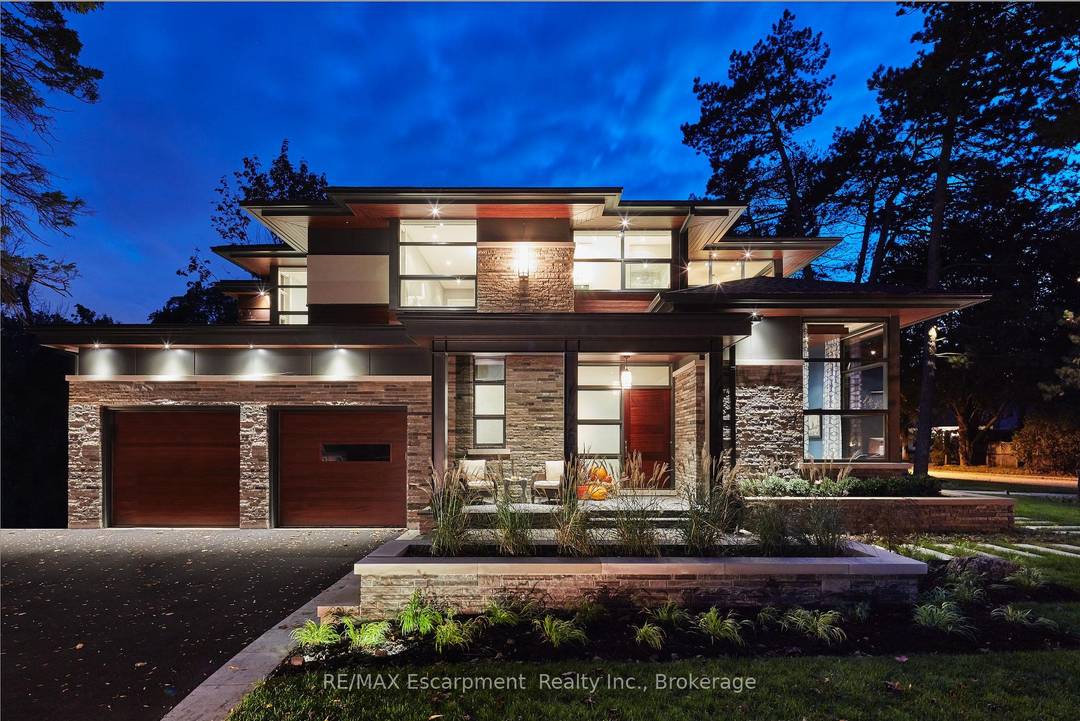 An exceptional custom built luxury residence in Burlington's most coveted neighbourhood Roseland.