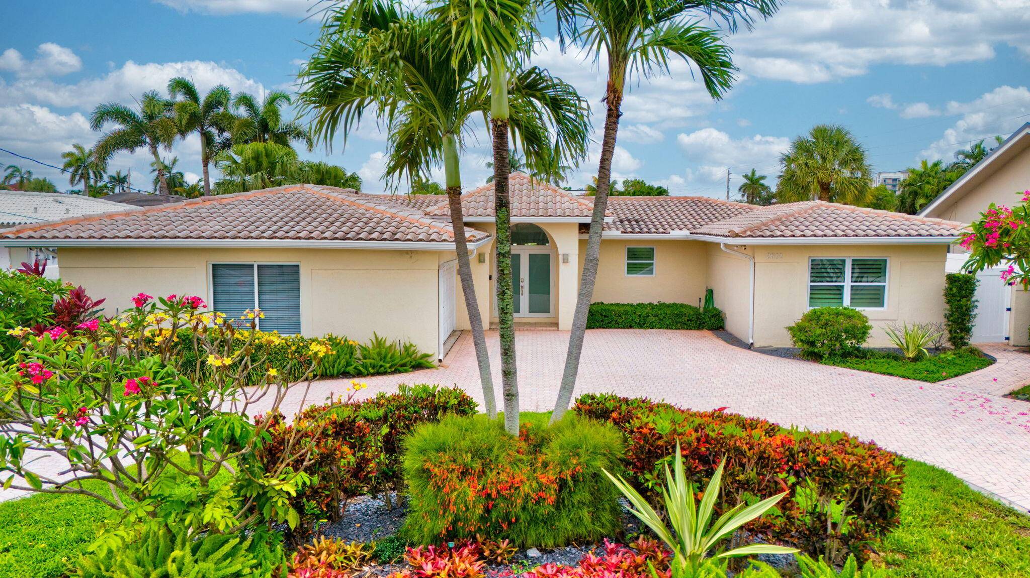 Welcome to 2612 NE 5th St in the sought after Harbor Village of Pompano Beach.