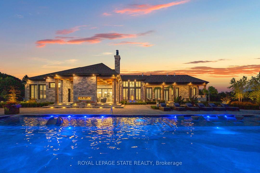 Set amidst a 5. 2 acre estate, this extraordinary 32, 000 sq ft mansion offers unparalleled luxury and privacy.