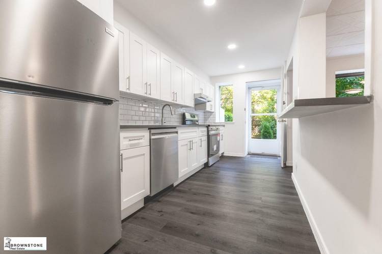 81 1st Place is an extra wide townhouse on one of the most prized blocks in Carroll Gardens.