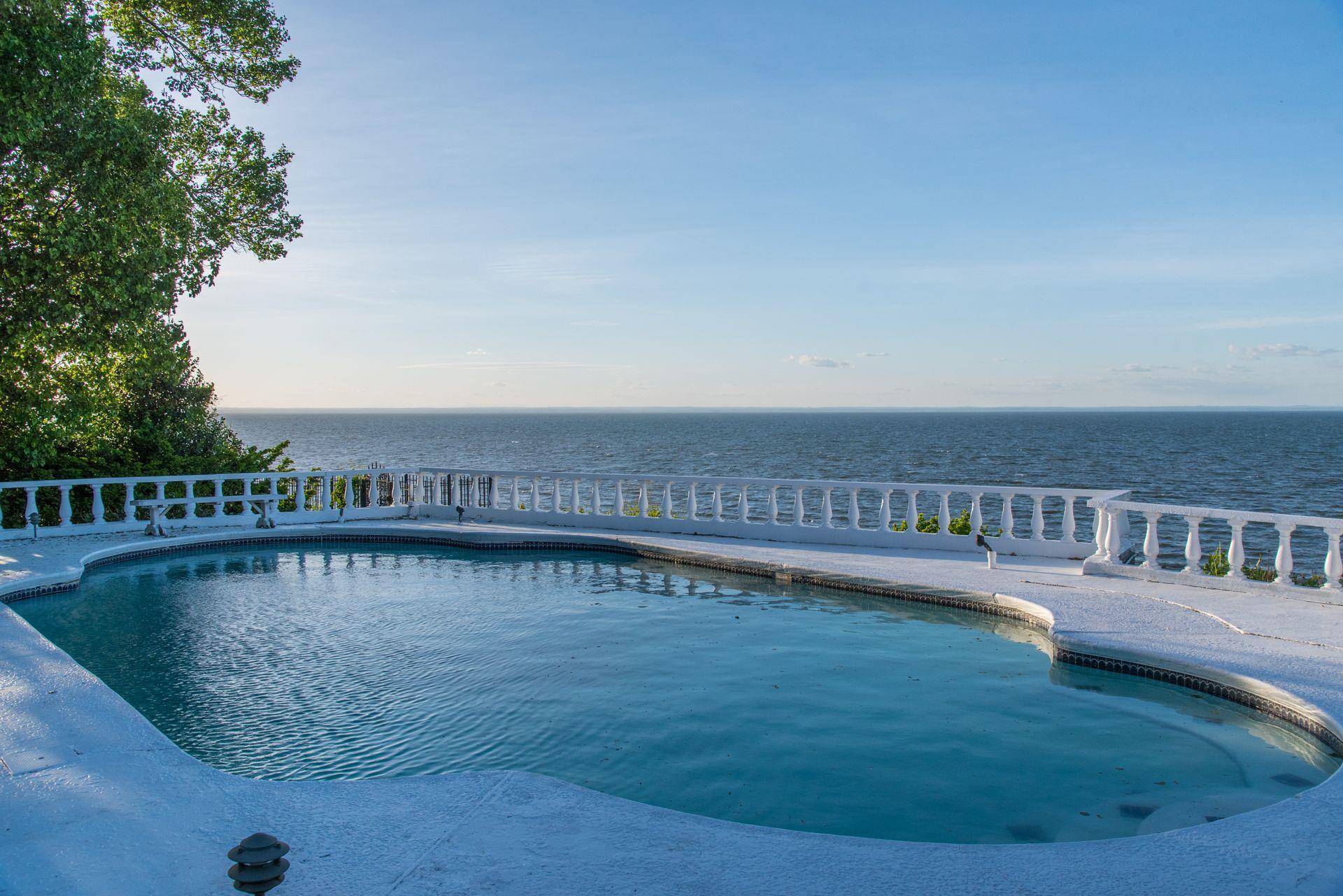 Northport WATERFRONT. Gated and enchanting waterfront retreat unlike no other.