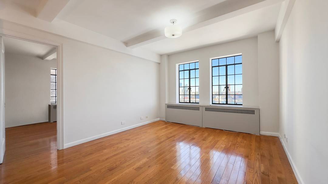 Modern Comfort meets Pre War Charm in this 1 bedroom apartment with stunning views of the East River.