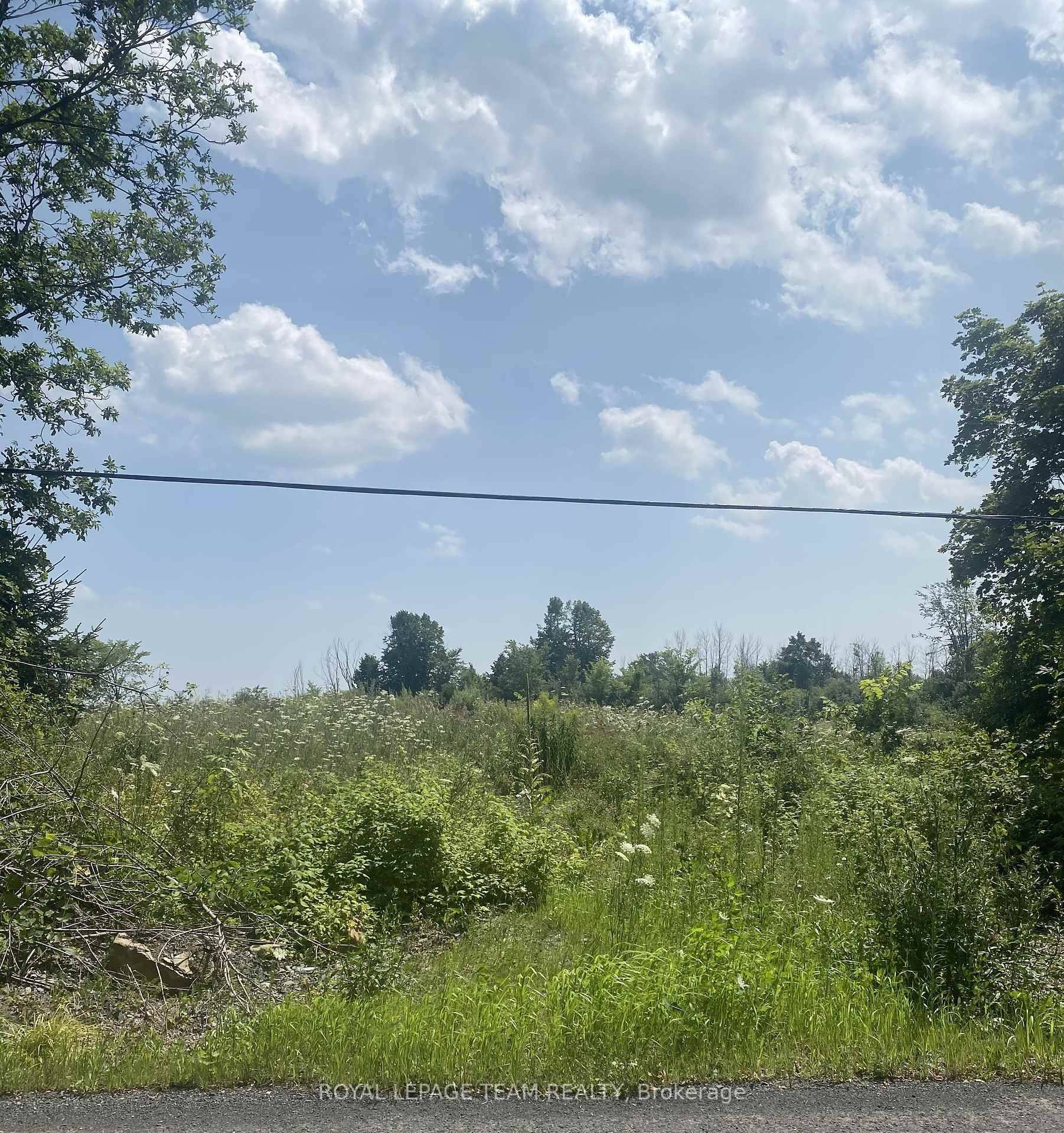Build your custom dream home on Lot 5 in Winchester's Orchard Grove Development, a large 2.