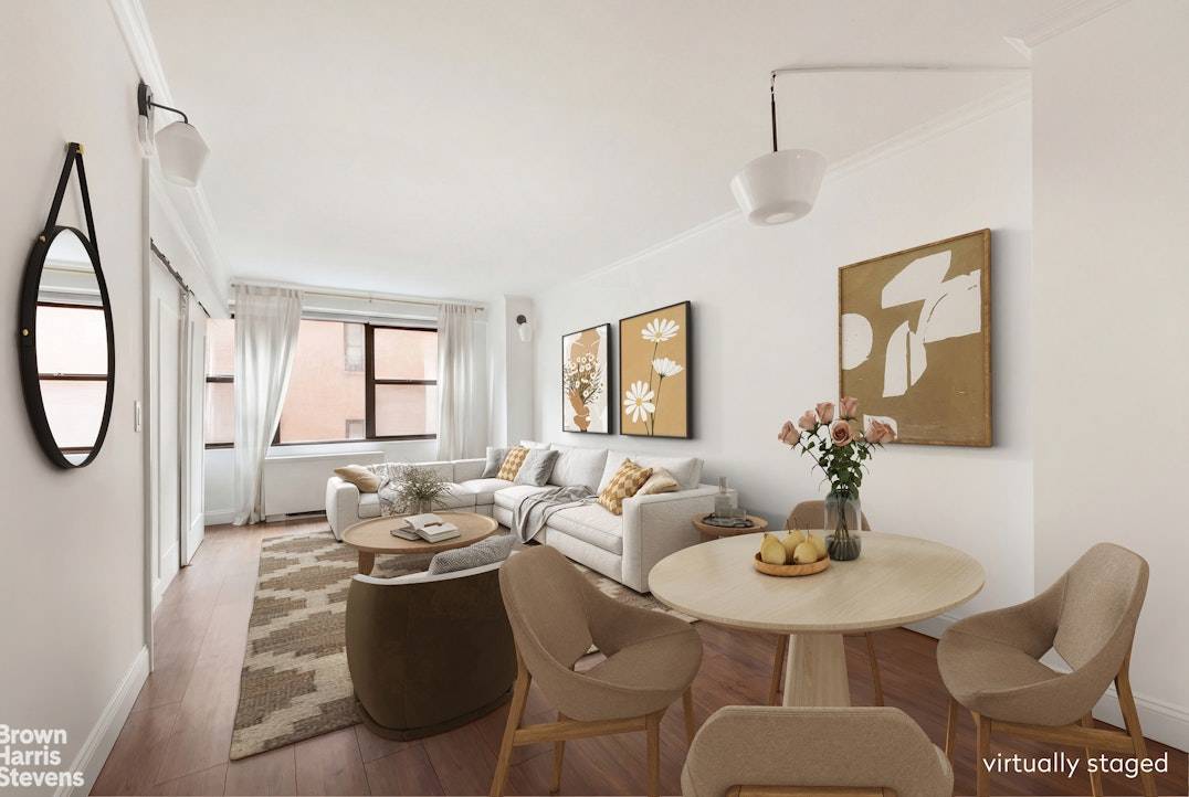 Beautiful, bright and and spacious south facing alcove studio features mounted barn doors separating the living room and bedroom area.