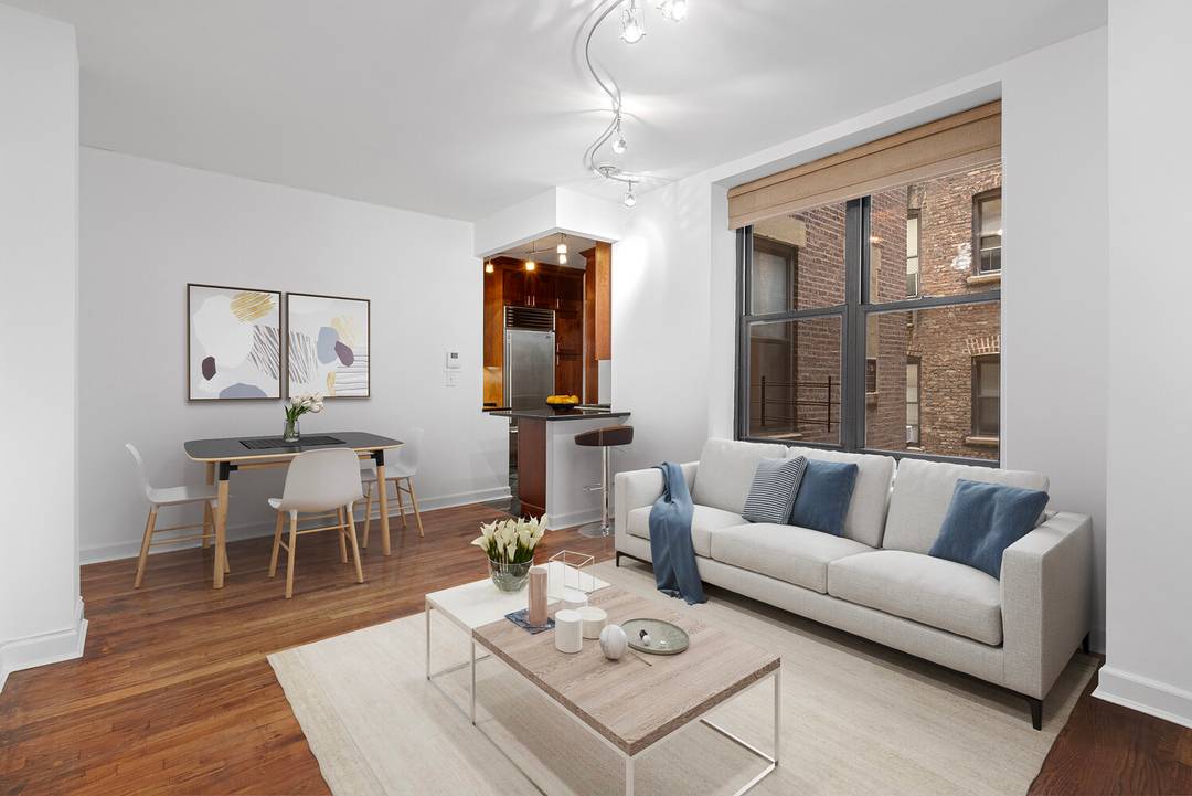 Live Just One Block Off Central Park !