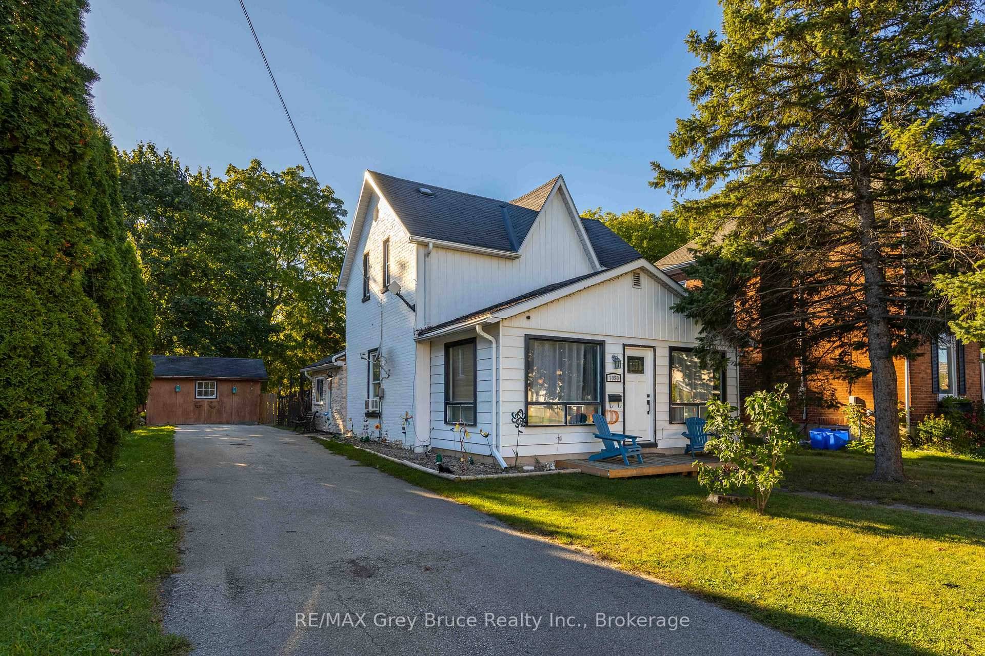 Lovely family home featuring a mudroom leading into the large eat in kitchen with updated cabinetry, backsplash, and counter top, master bedroom, livingroom, laundry room, 4 pc bath, large playroom ...