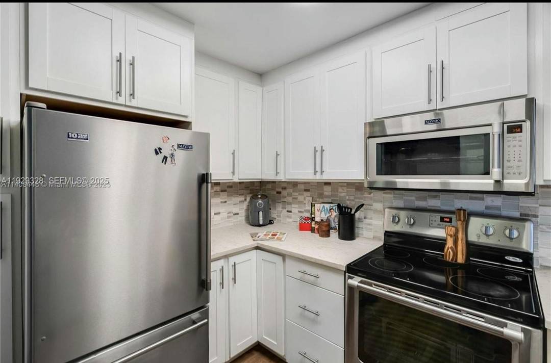 Step into this spacious corner unit, perfectly situated in the highly desirable Country Pines community.