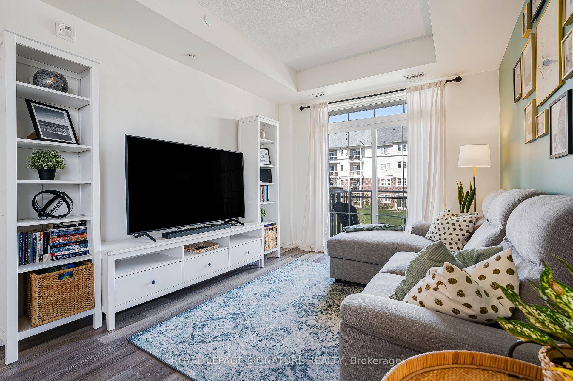 This well maintained unit offers a functional open concept layout with modern finishes throughout.