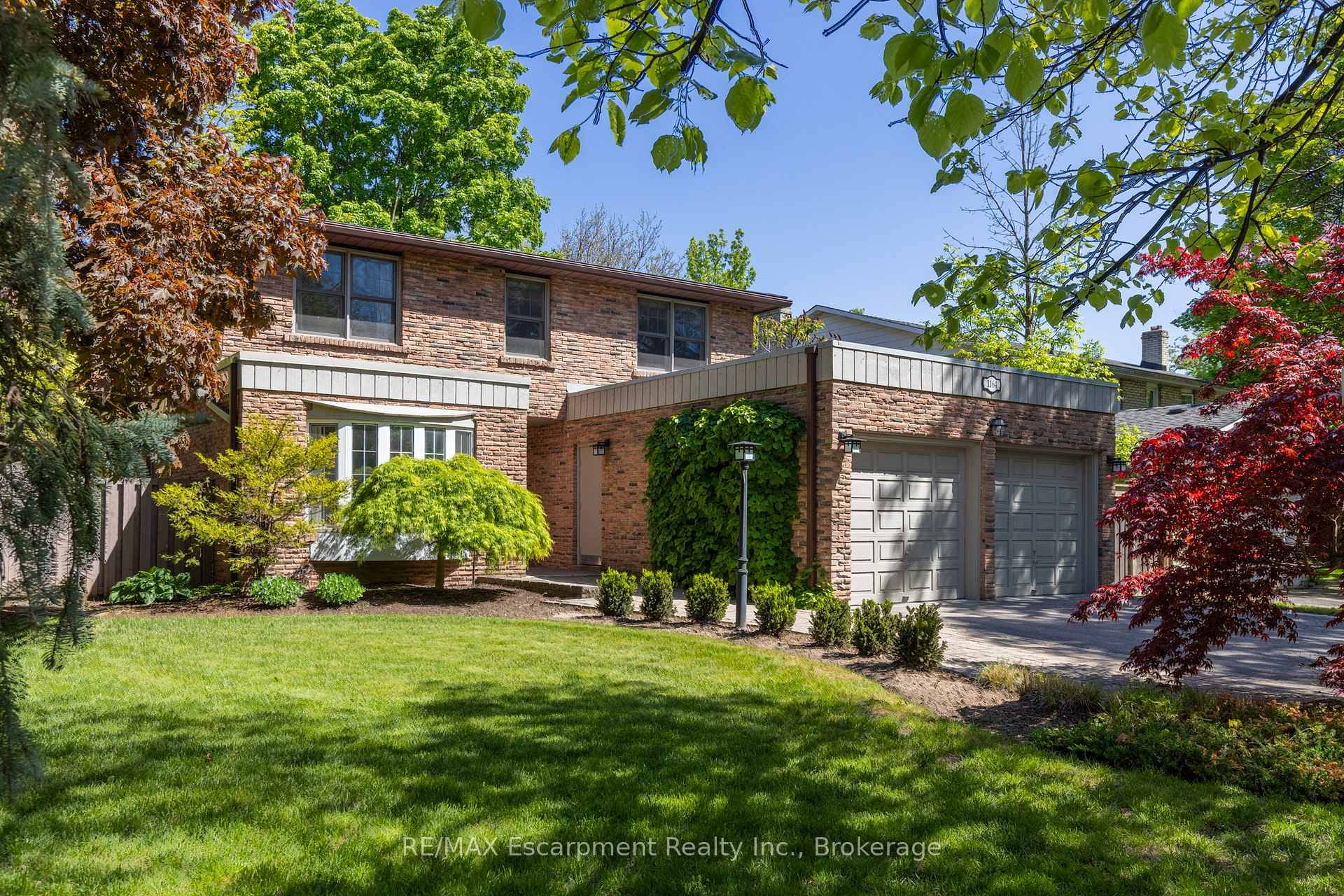 Nestled in a picturesque enclave of sought after South East Oakville, this lovingly cared for home awaits its next family.